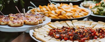 Wedding reception featuring a budget-friendly buffet-style meal, interactive taco bar, or casual pizza party, offering a variety of delicious dishes and creating an unforgettable celebration without high costs